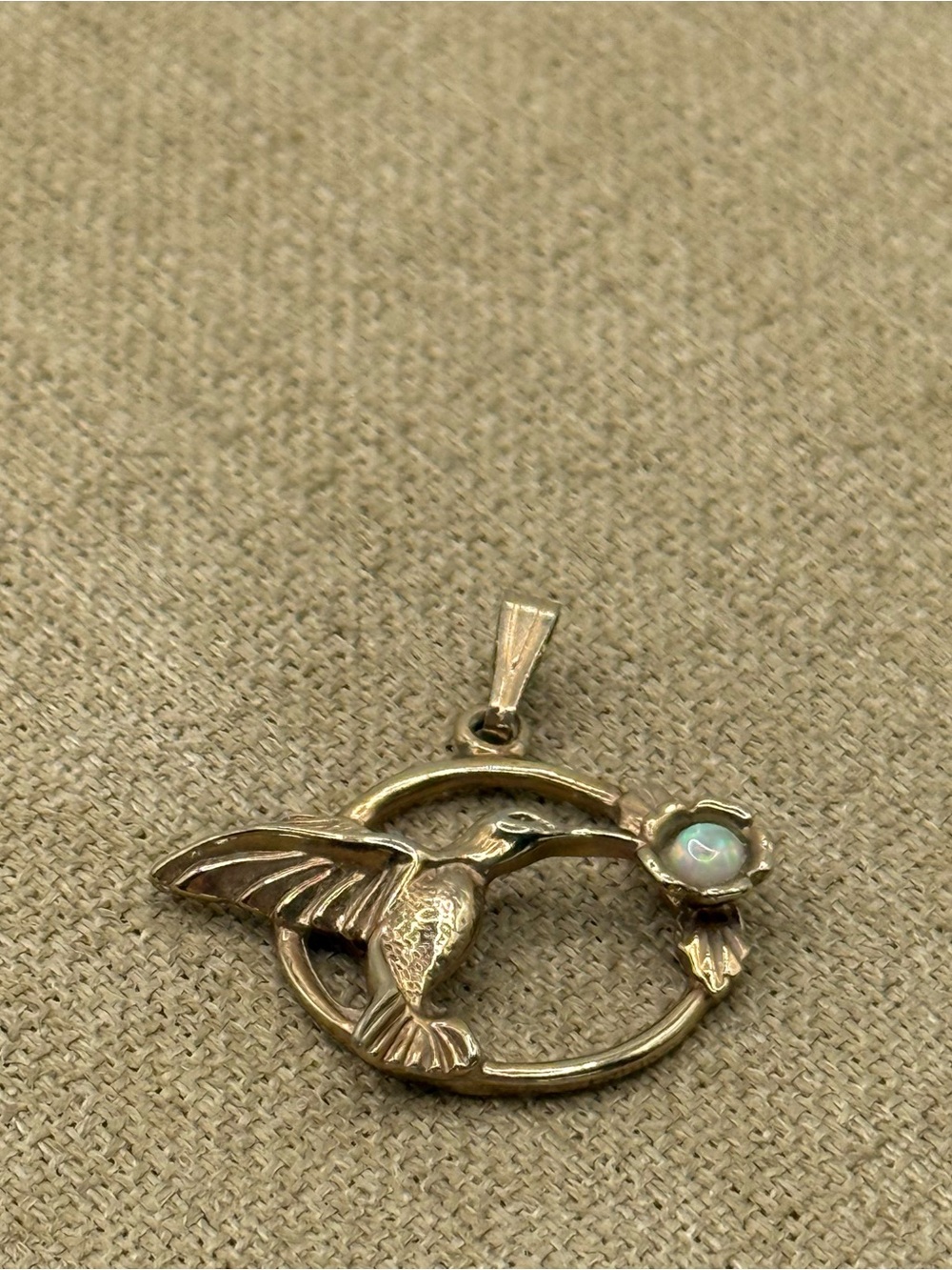 Gold tone Hummingbird Pendant with Opal Accent